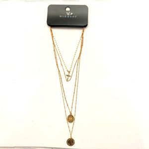 Gold color 4 layered chains with hanging charms brand new